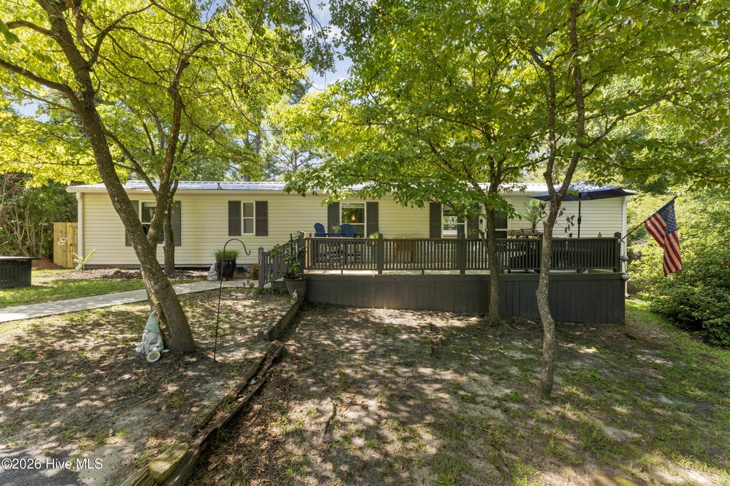 Photo of 303 Buck Drive, Hampstead, NC 28443 (MLS # 100601012)