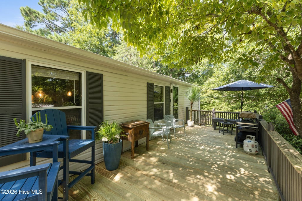 Photo of 303 Buck Drive, Hampstead, NC 28443 (MLS # 100601012)