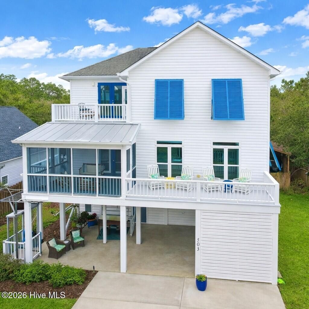 Photo of 503 W Yacht Drive, Oak Island, NC 28465 (MLS # 100556182)