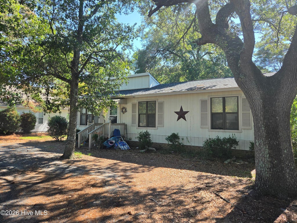 Photo of 7503 E Oak Island Drive, Oak Island, NC 28465 (MLS # 100611374)