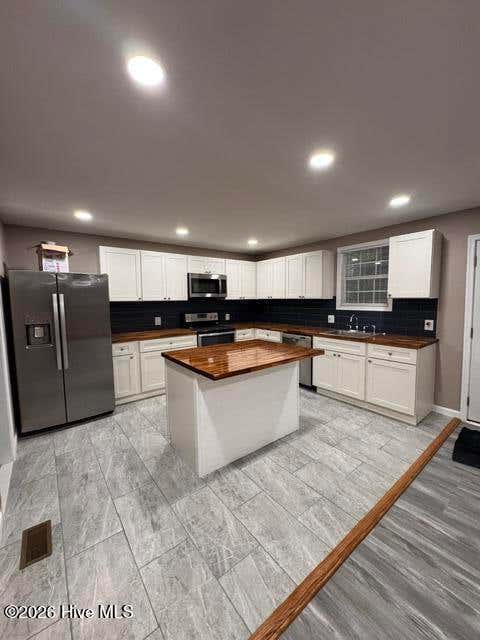 Photo of 211 E Williamson Street, Mount Olive, NC 28365 (MLS # 100577741)