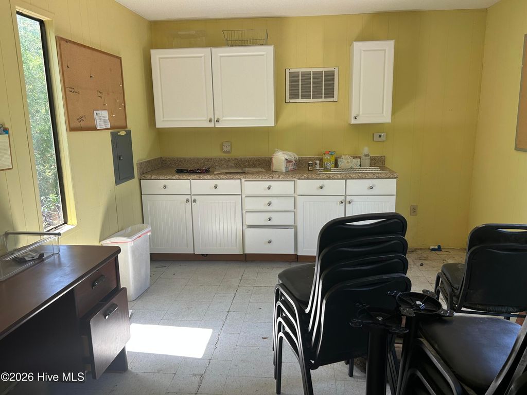 Photo of 100 1st Street, Laurinburg, NC 28352 (MLS # 100571676)