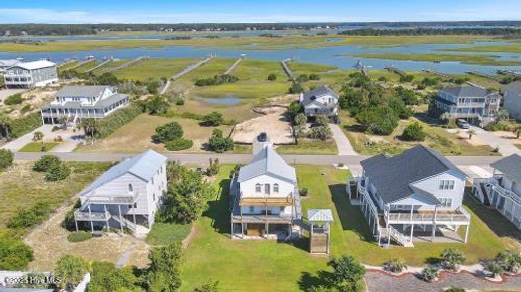 Photo of 6707 Kings Lynn Drive, Oak Island, NC 28465 (MLS # 100510345)