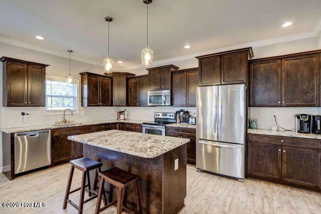 Photo of 120 Camelot Drive, Holly Ridge, NC 28445 (MLS # 100573947)