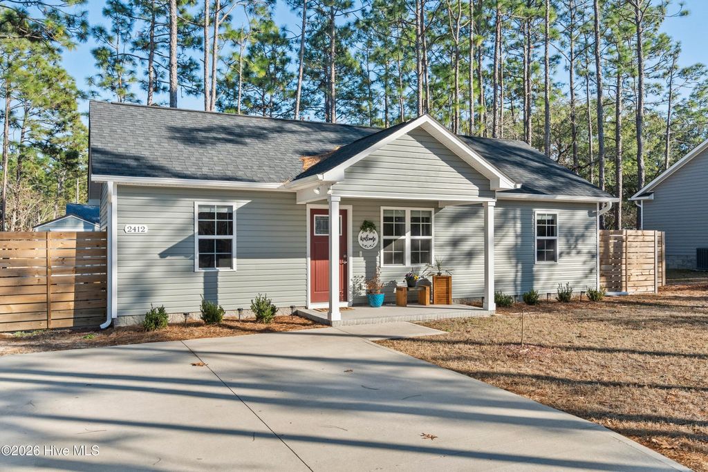 Photo of 2412 Frink Lake Drive, Southport, NC 28461 (MLS # 100548335)