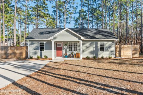 Photo of 2412 Frink Lake Drive, Southport, NC 28461 (MLS # 100548335)