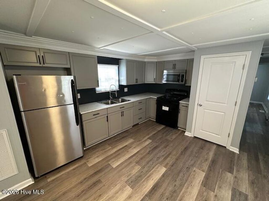 Photo of 511 Dogwood Drive, Sunset Beach, NC 28468 (MLS # 100562323)