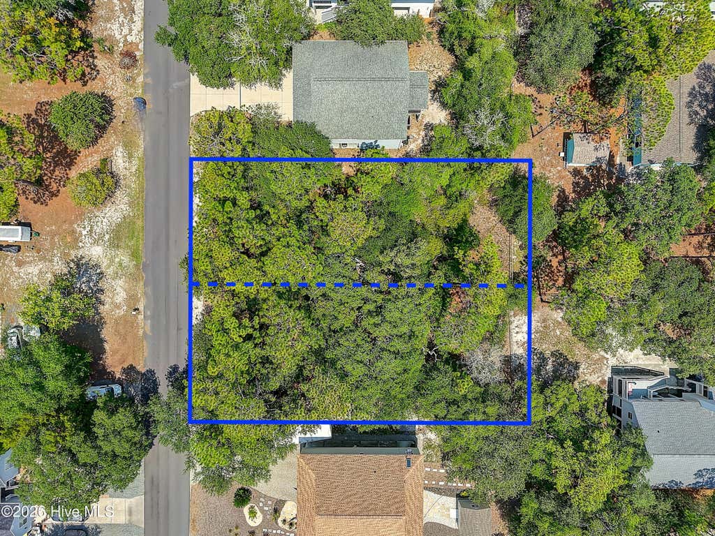 Photo of 158 NW 2nd Street, Oak Island, NC 28465 (MLS # 100595139)
