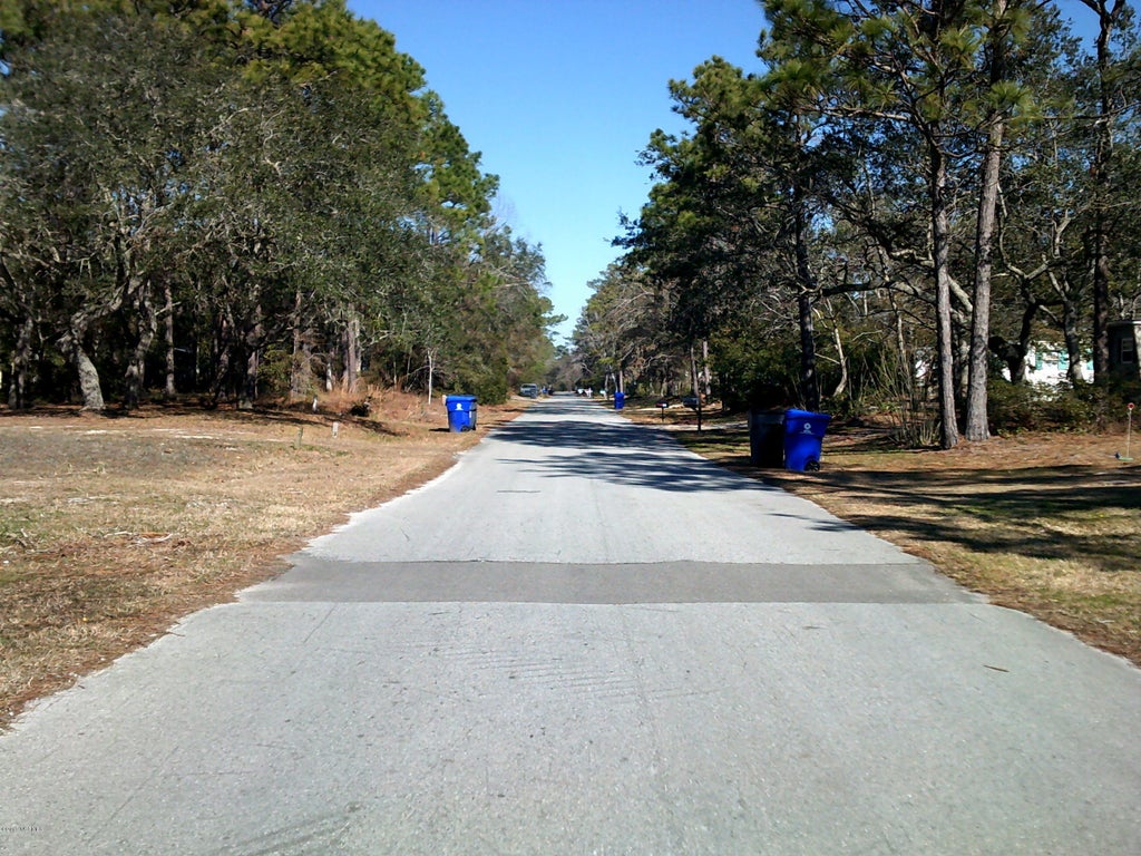 Photo of 209 NE 69th Street, Oak Island, NC 28465 (MLS # 100610410)