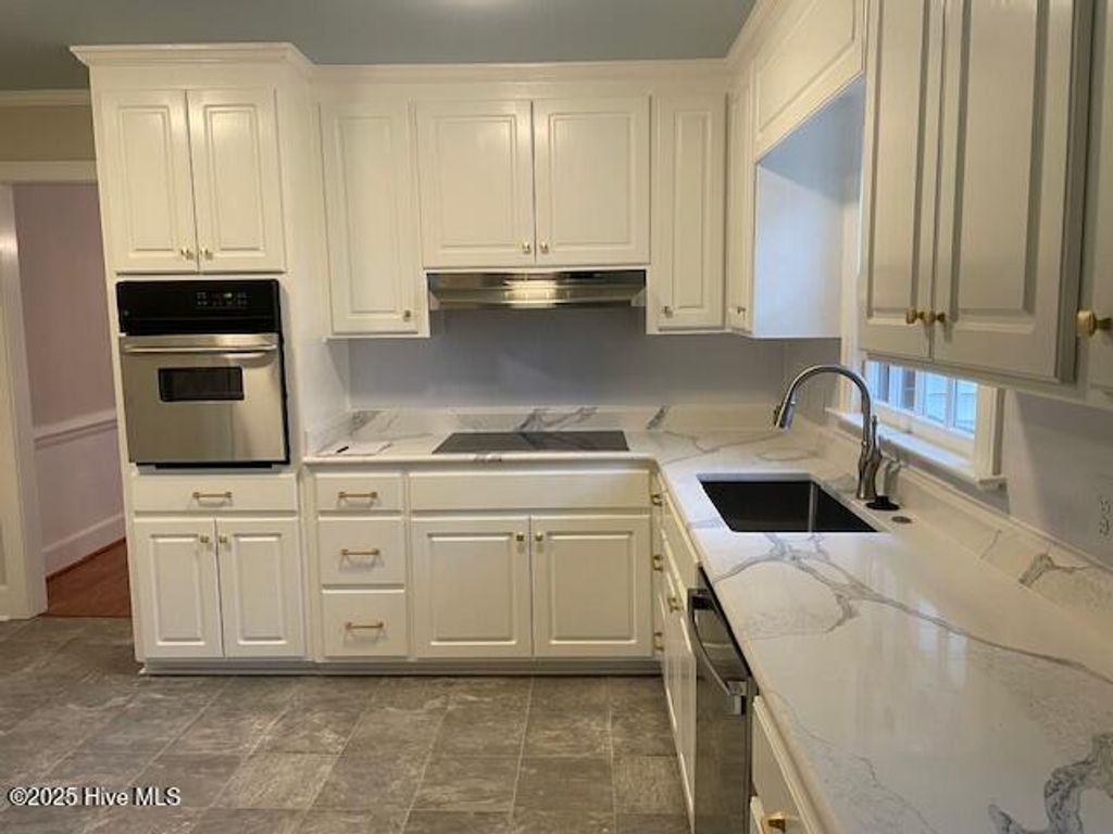 Photo of 303 Ridge Road NW, Wilson, NC 27896 (MLS # 100546919)