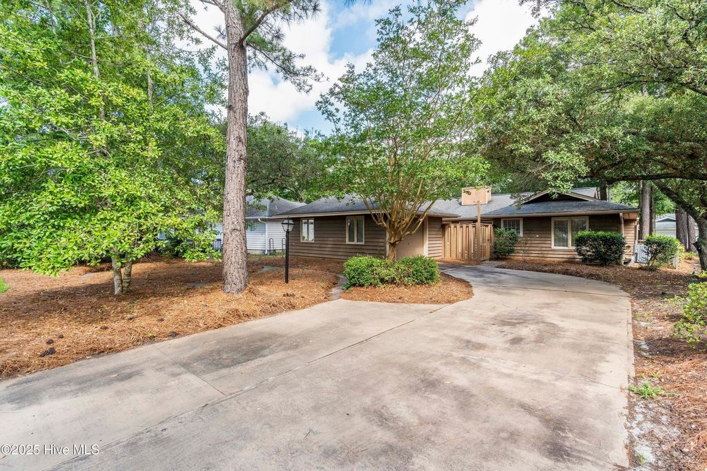 Photo of 608 Camellia Lane, Sunset Beach, NC 28468 (MLS # 100517160)