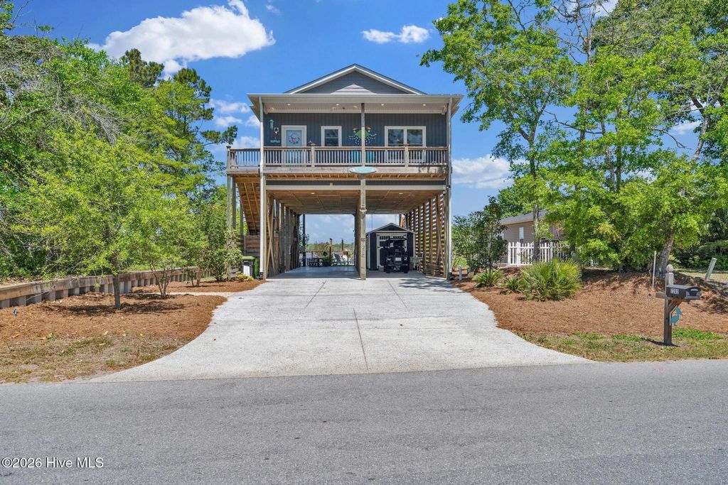 Photo of 7202 E Yacht Drive, Oak Island, NC 28465 (MLS # 100569220)