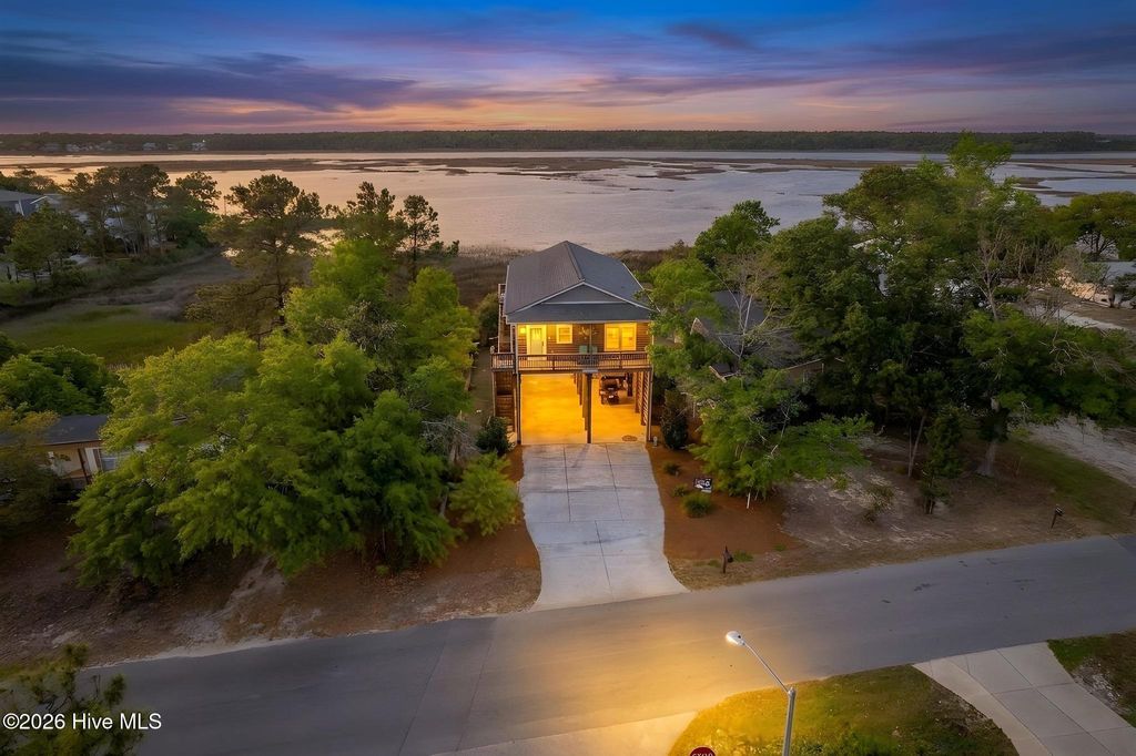 Photo of 7202 E Yacht Drive, Oak Island, NC 28465 (MLS # 100569220)