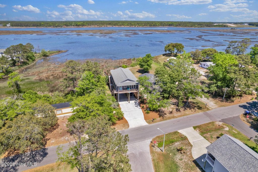 Photo of 7202 E Yacht Drive, Oak Island, NC 28465 (MLS # 100569220)
