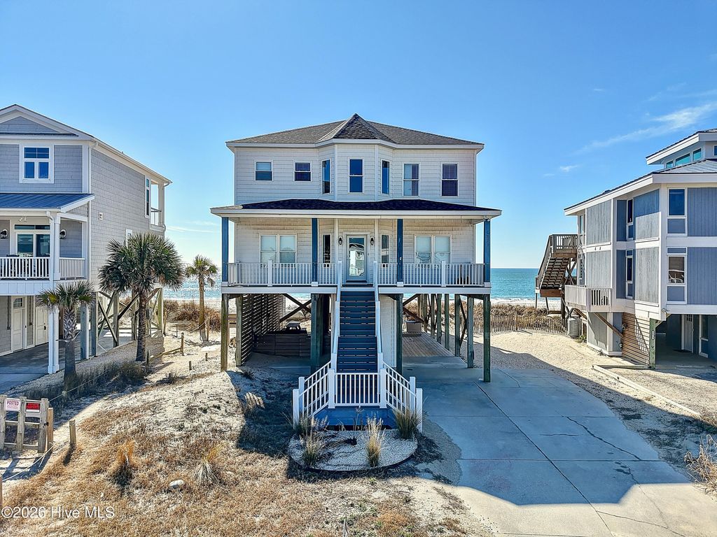 Photo of 6621 W Beach Drive, Oak Island, NC 28465 (MLS # 100554405)