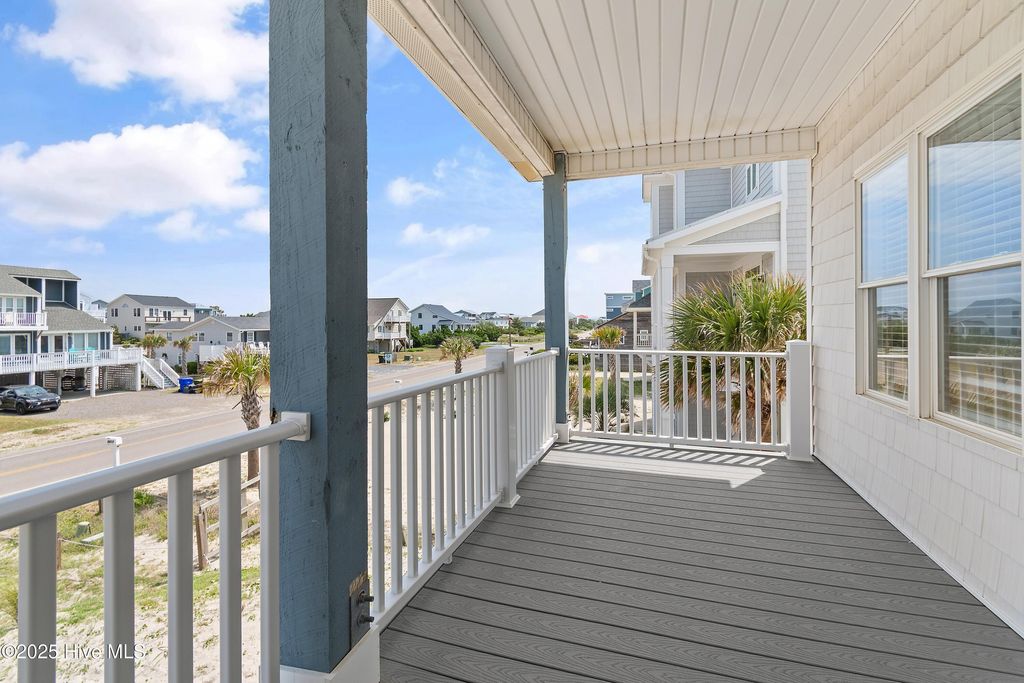 Photo of 6621 W Beach Drive, Oak Island, NC 28465 (MLS # 100554405)