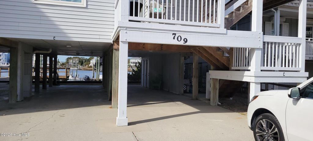 Photo of 709 Canal Drive #Apt 2c, Carolina Beach, NC 28428 (MLS # 100550642)