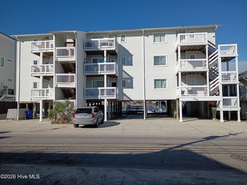 Photo of 709 Canal Drive #Apt 2c, Carolina Beach, NC 28428 (MLS # 100550642)