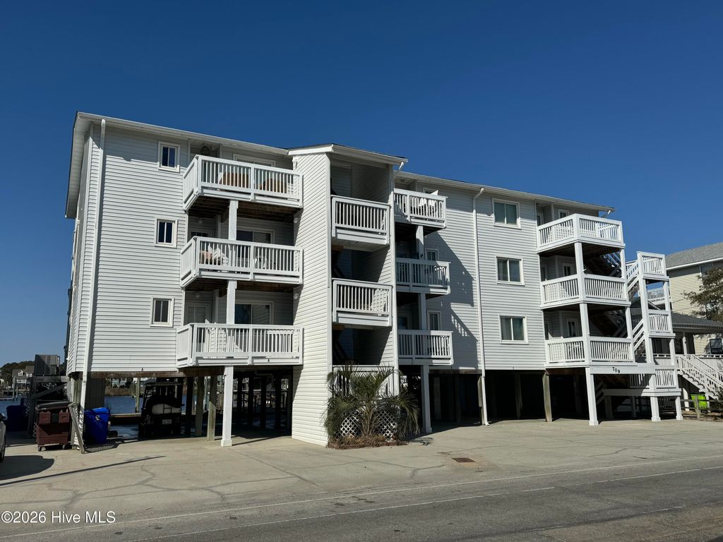Photo of 709 Canal Drive #Apt 2c, Carolina Beach, NC 28428 (MLS # 100550642)