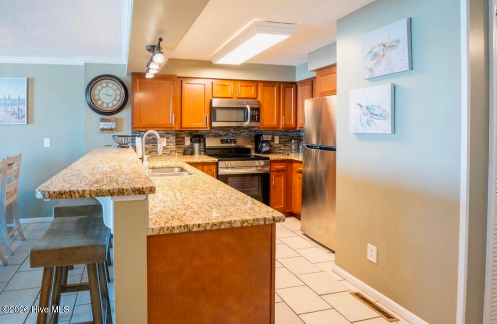 Photo of 2116 Surfrider Court #C, Kure Beach, NC 28449 (MLS # 100592618)
