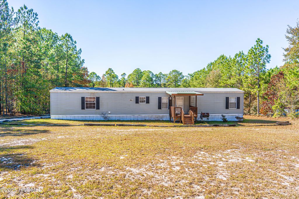 Photo of 406 Wiregrass Road, Rockingham, NC 28379 (MLS # 100544575)