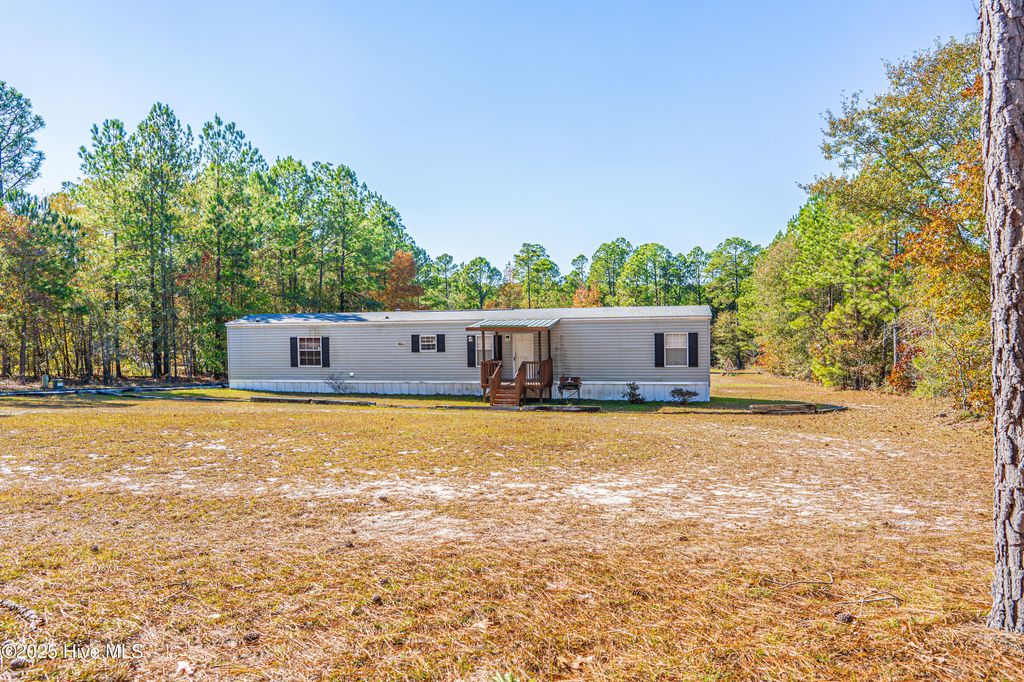 Photo of 406 Wiregrass Road, Rockingham, NC 28379 (MLS # 100544575)