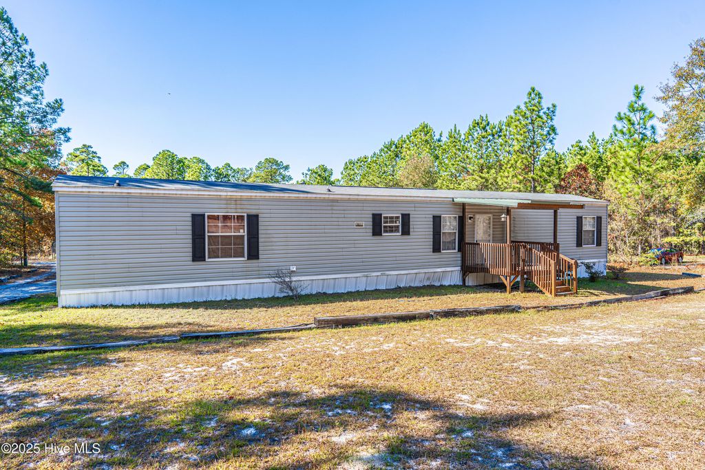 Photo of 406 Wiregrass Road, Rockingham, NC 28379 (MLS # 100544575)