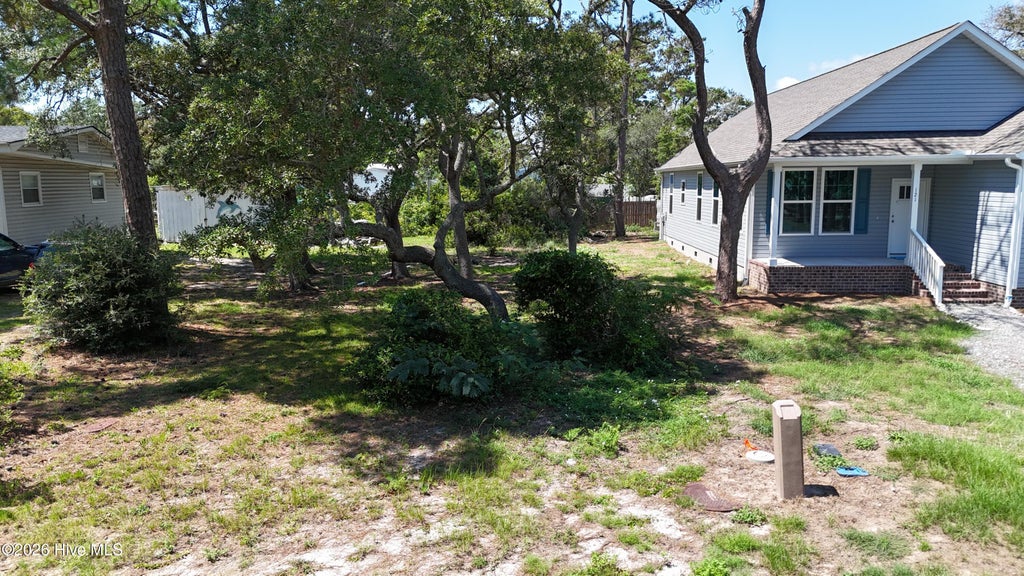 Photo of 119 NE 77th Street, Oak Island, NC 28465 (MLS # 100601160)