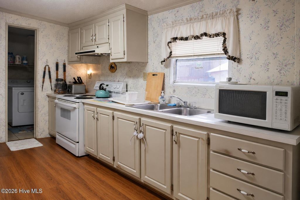 Photo of 5165 Green Heron Drive SW, Shallotte, NC 28470 (MLS # 100576891)