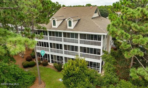 Photo of 3350 Club Villas Drive #502, Southport, NC 28461 (MLS # 100526427)