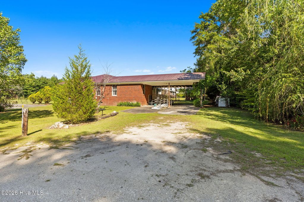 Photo of 345 Pleasant Plains Church Road, Whiteville, NC 28472 (MLS # 100576338)