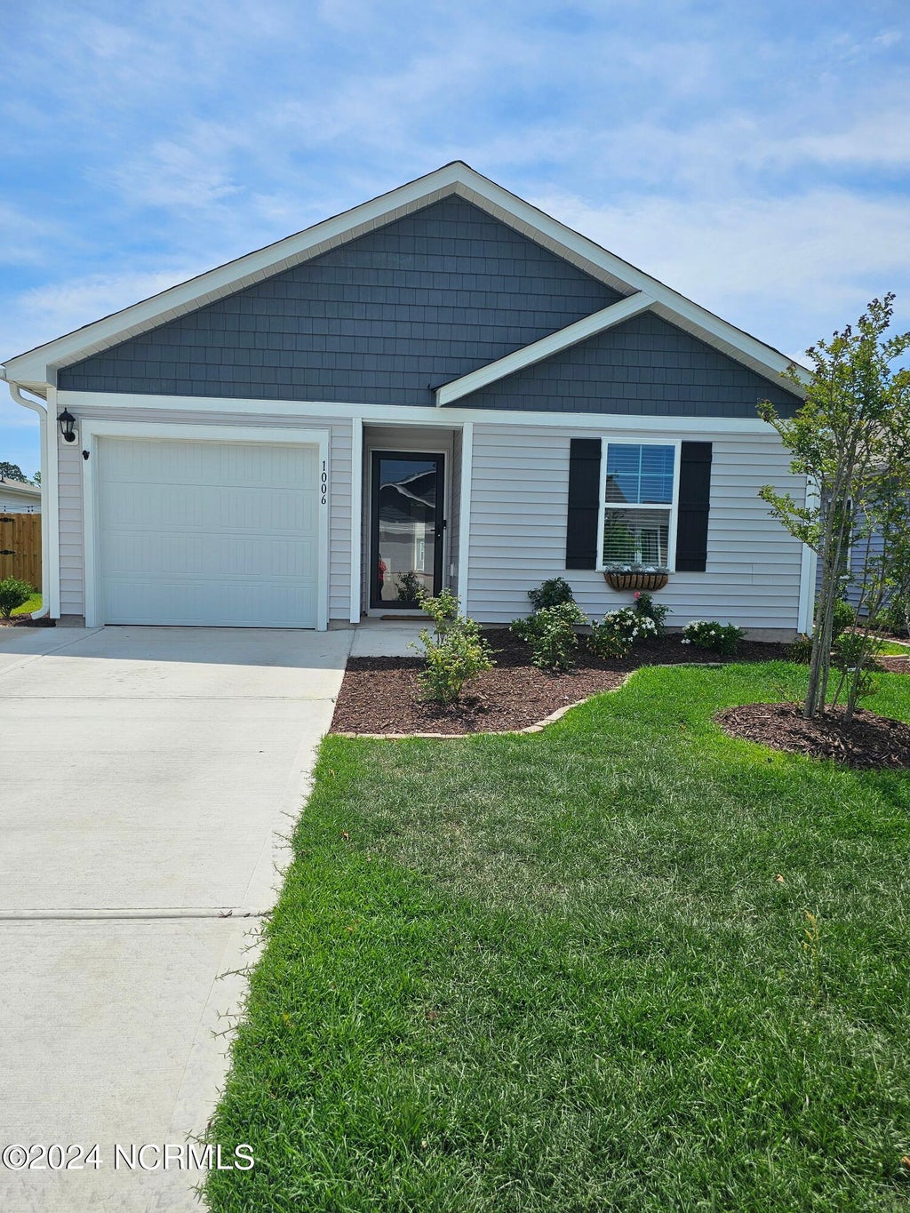 Photo of 1006 Course Lane, Surf City, NC 28445 (MLS # 100590639)