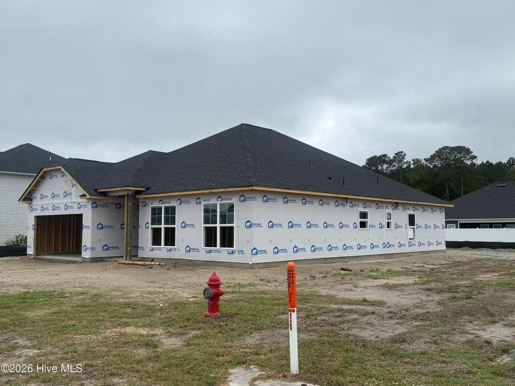 Photo of 404 Sandcastle Street, Grimesland, NC 27837 (MLS # 100554883)