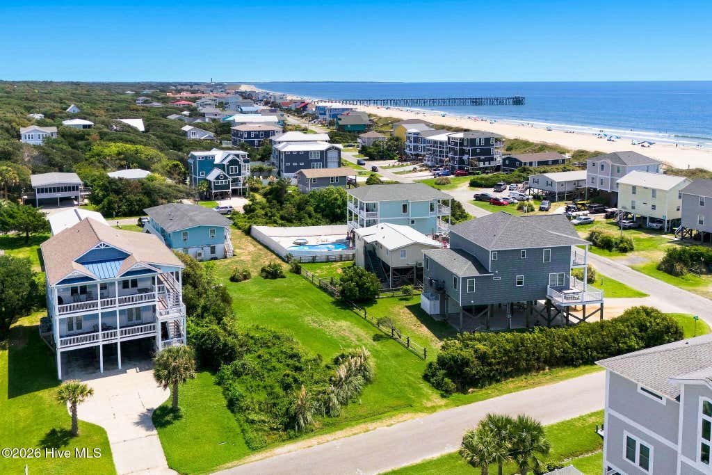Photo of 210 SE 76th Street, Oak Island, NC 28465 (MLS # 100598032)