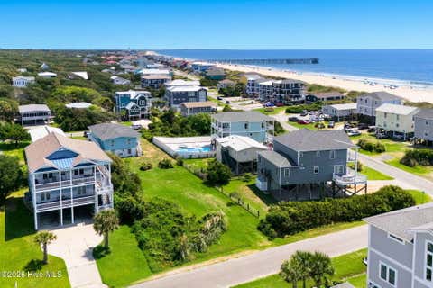 Photo of 210 SE 76th Street, Oak Island, NC 28465 (MLS # 100598032)