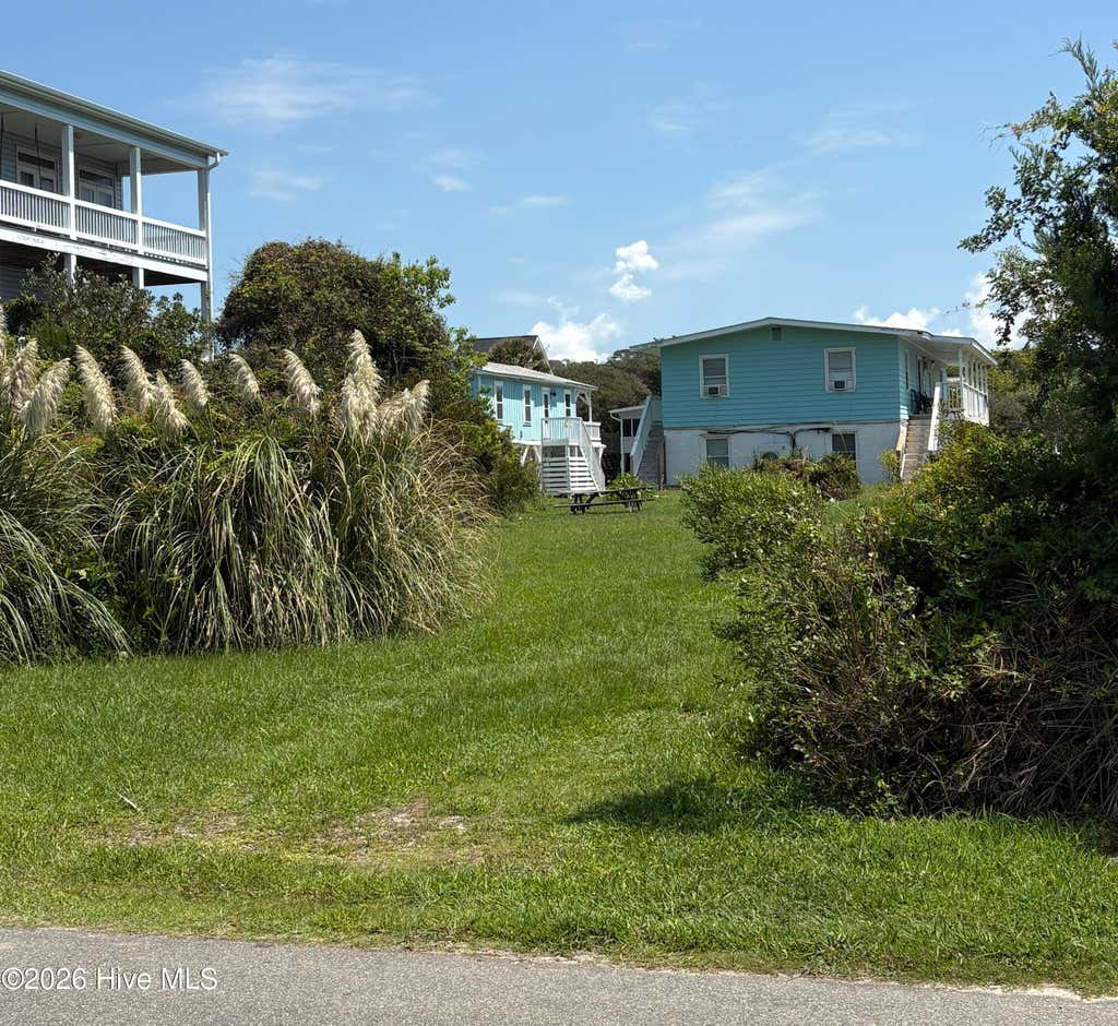 Photo of 210 SE 76th Street, Oak Island, NC 28465 (MLS # 100598032)