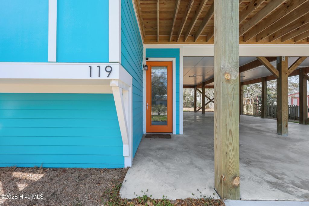 Photo of 119 NE 27th Street, Oak Island, NC 28465 (MLS # 100558467)
