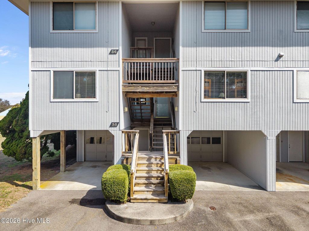 Photo of 35 Foxfire Trace, Oak Island, NC 28465 (MLS # 100558305)