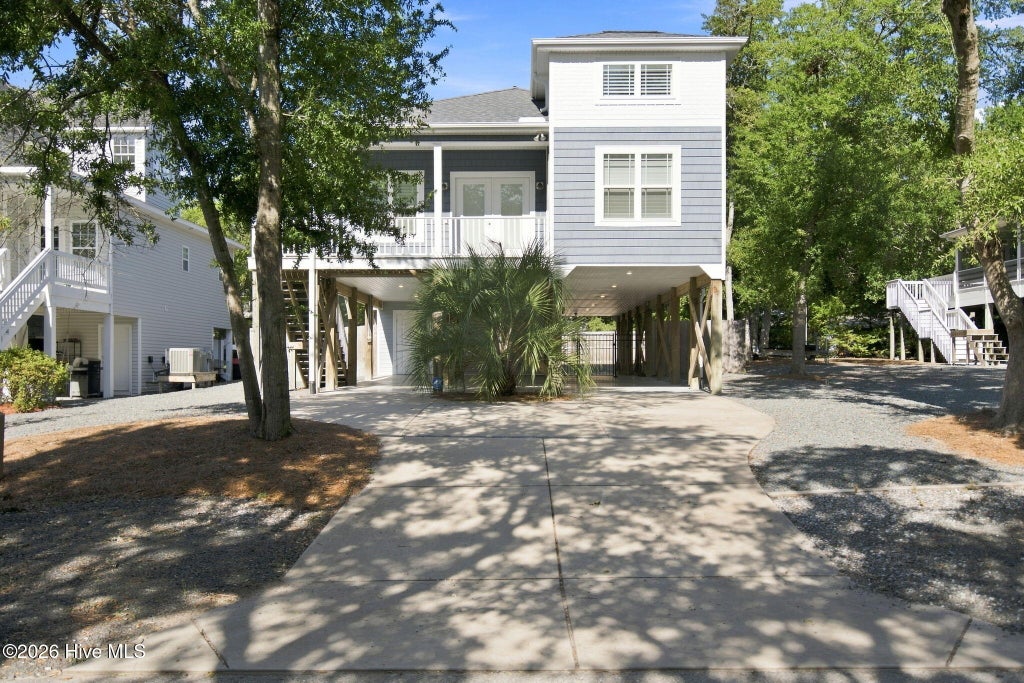 Photo of 119 SW 12th Street, Oak Island, NC 28465 (MLS # 100602589)