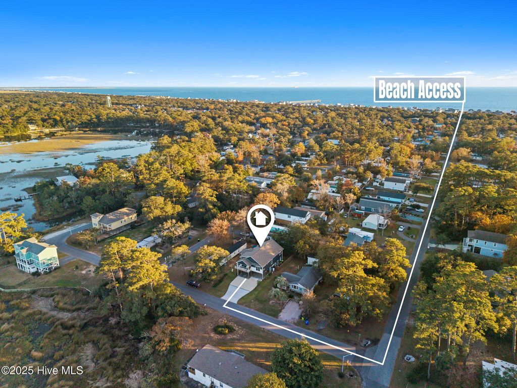 Photo of 7605 E Yacht Drive NE, Oak Island, NC 28465 (MLS # 100564542)