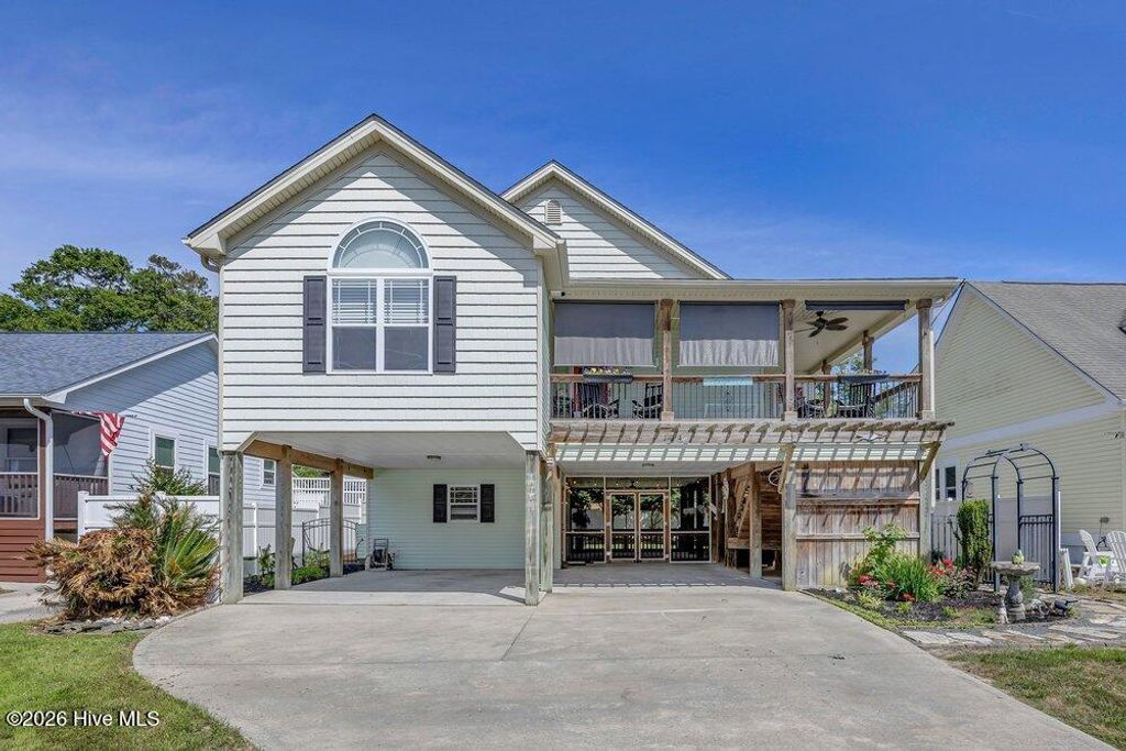 Photo of 104 NE 8th Street, Oak Island, NC 28465 (MLS # 100573077)