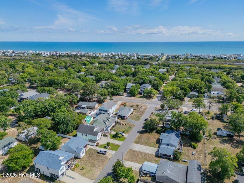 Photo of 104 NE 8th Street, Oak Island, NC 28465 (MLS # 100573077)