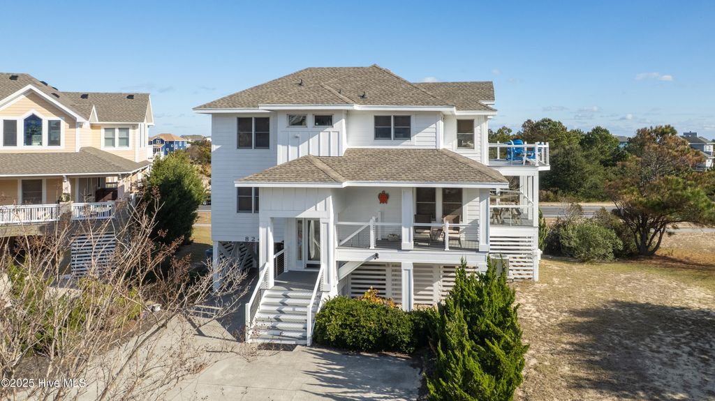 Photo of 824 Windswept Court, Corolla, NC 27927 (MLS # 100545763)
