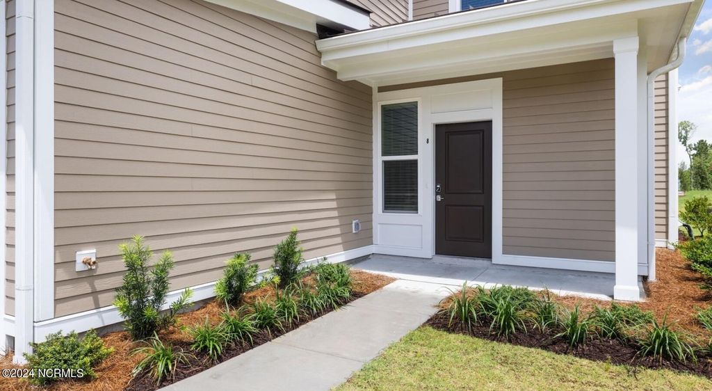 Photo of 8067 Purchase Place NE #Sanibel, Leland, NC 28451 (MLS # 100543618)