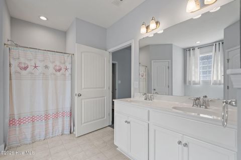 Tiny photo for 106 NW 19th Street, Oak Island, NC 28465 (MLS # 100563124)