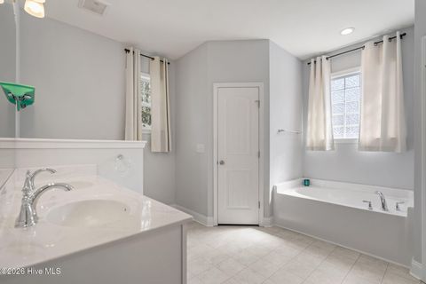 Tiny photo for 106 NW 19th Street, Oak Island, NC 28465 (MLS # 100563124)