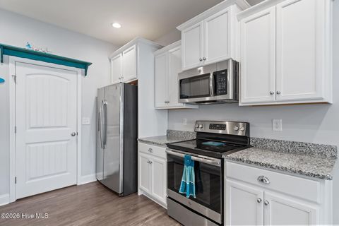 Tiny photo for 106 NW 19th Street, Oak Island, NC 28465 (MLS # 100563124)