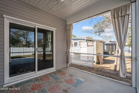 Tiny photo for 106 NW 19th Street, Oak Island, NC 28465 (MLS # 100563124)