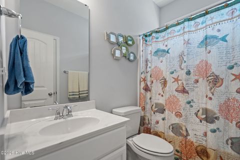 Tiny photo for 106 NW 19th Street, Oak Island, NC 28465 (MLS # 100563124)