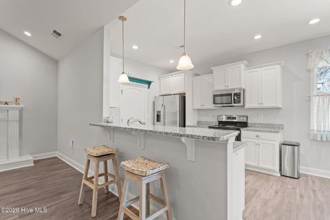 Tiny photo for 106 NW 19th Street, Oak Island, NC 28465 (MLS # 100563124)